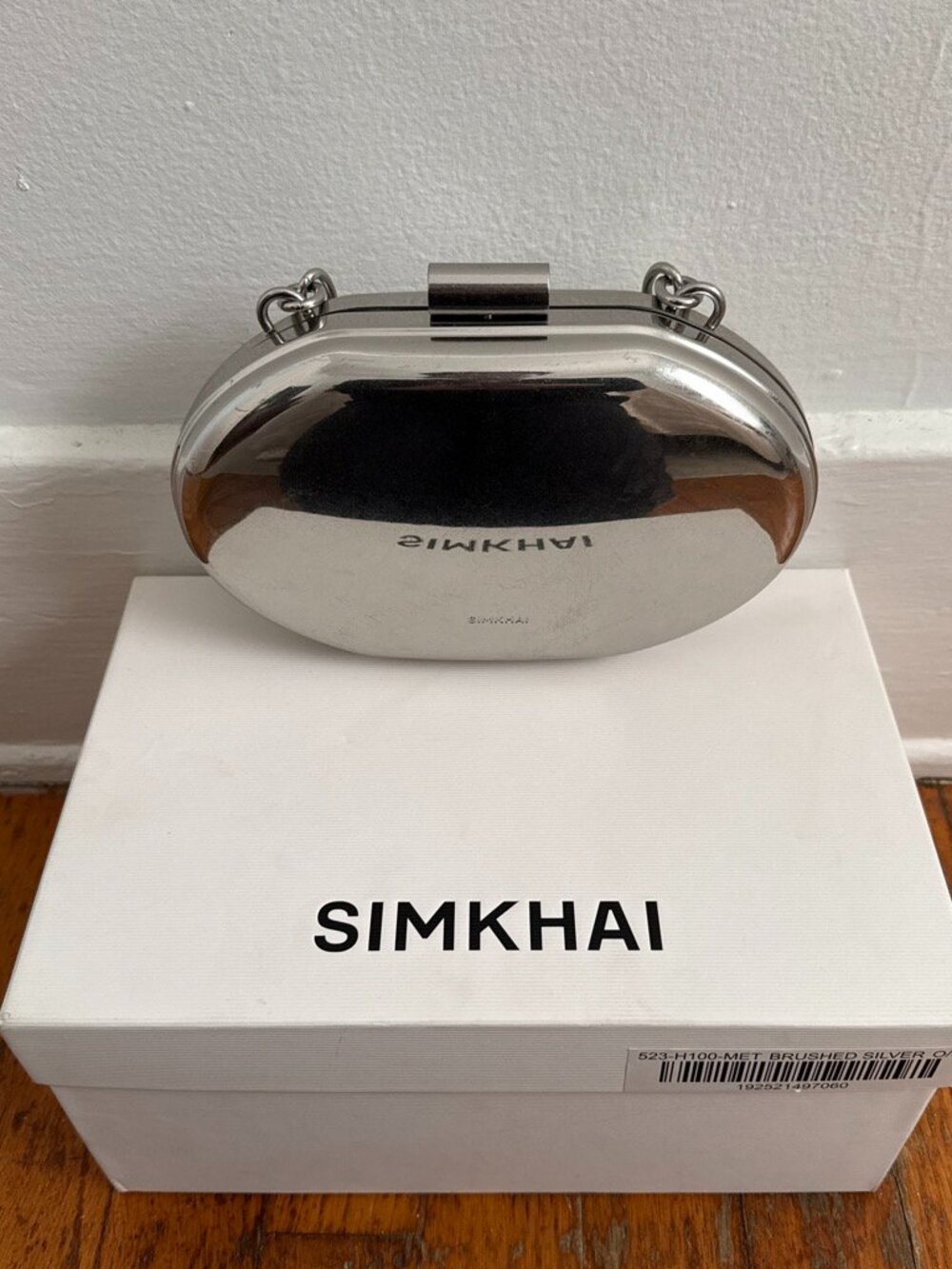 SIMKHAI Sol Oval Metal Clutch
